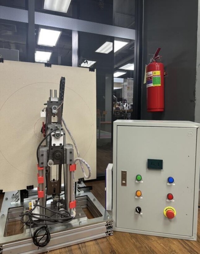 The RP Plotter and its control cabinet.